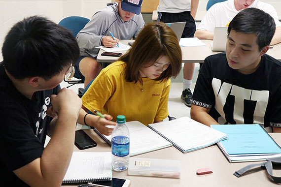 Three students working in study group